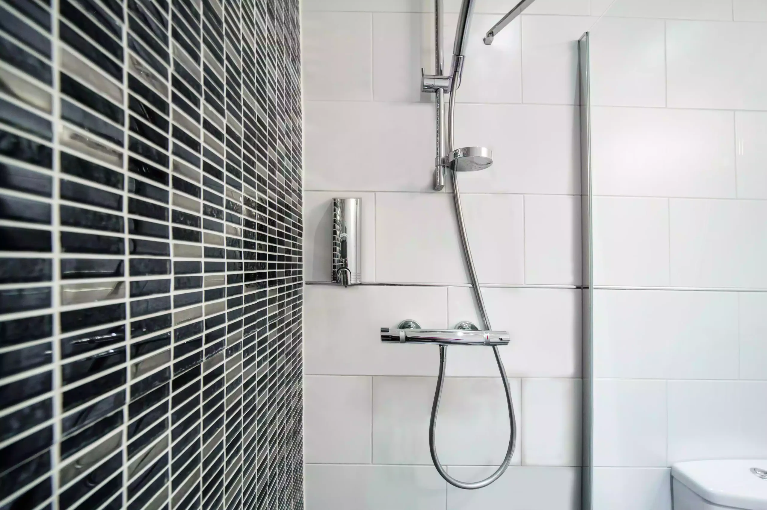 Modern shower in the bathroom at Mentone Hotel