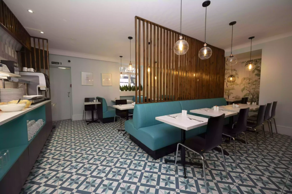 Modern, decorated breakfast room in Mentone Hotel