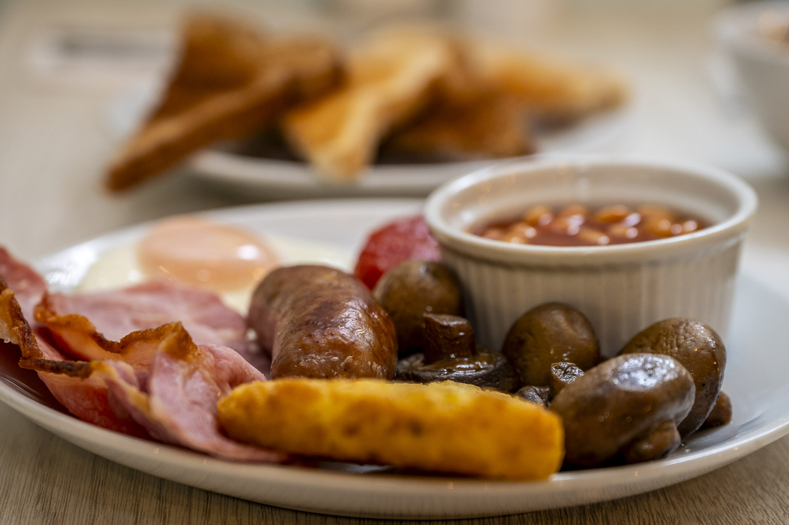 Full English breakfast from Mentone Hotel, including bacon, sausage, fried egg, grilled tomato, mushrooms, hash brown, and baked beans Full English breakfast from Mentone Hotel